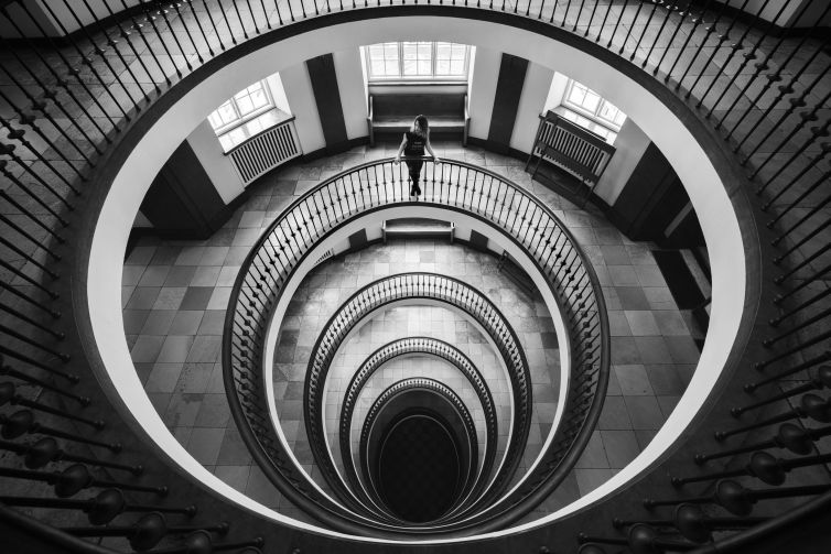Monochrome image of a spiral staircase in Copenhagen, Denmark.