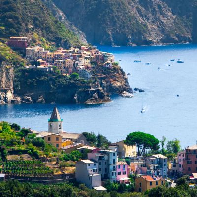 Vernazza village with colorful buildings by the Mediterranean sea.