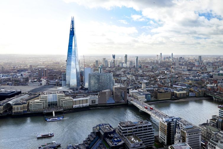 Skyline of London featuring the Shard and the River Thames.